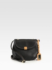 A tri-tone leather style perfect for your essentials.Detachable adjustable shoulder strap, 20-25 dropMagnetic snap flap closureCotton lining9W X 7H X 2½DImported A tri-tone leather style perfect for your essentials.Detachable adjustable shoulder strap, 20-25 dropMagnetic snap flap closureCotton lining9W X 7H X 2½DImported