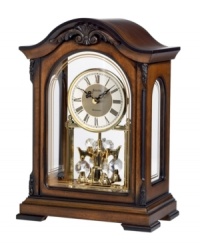 A timeless decorative accent, by Bulova. This solid wood mantel clock with an Old World walnut finish perfectly suits an office. Decoratively carved case with screened glass front and side panels and removable clear acrylic back houses a metal dial and revolving crystal pendulum. Plays Westminster melody on the hour. A timeless decorative accent, by Bulova. This solid wood mantel clock with an Old World walnut finish perfectly suits an office. Decoratively carved case with screened glass front and side panels and removable clear acrylic back houses a metal dial and revolving crystal pendulum. Plays Westminster melody on the hour.