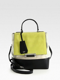Sumptuous paneled leather in contrasting hues forms this roomy shape with a versatile strap. Adjustable detachable shoulder strap, 19-21½ dropTop handle, 4½ dropPush-lock closure on front flapOne back zip pocketProtective metal feetOne inside zip pocketThree inside open pocketsFully lined10W X 11½H X 4¾DImported Sumptuous paneled leather in contrasting hues forms this roomy shape with a versatile strap. Adjustable detachable shoulder strap, 19-21½ dropTop handle, 4½ dropPush-lock closure on front flapOne back zip pocketProtective metal feetOne inside zip pocketThree inside open pocketsFully lined10W X 11½H X 4¾DImported