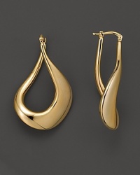 Decadent twists of 18K yellow gold are a bold new take on the traditional hoops. Decadent twists of 18K yellow gold are a bold new take on the traditional hoops.