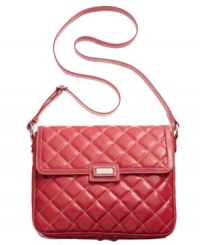 Have a spring fling with this adventure-ready design from Nine West. Easily take your iPad anywhere you go while keeping it protected in this stylish crossbody bag specially designed to keep your technology safe. Have a spring fling with this adventure-ready design from Nine West. Easily take your iPad anywhere you go while keeping it protected in this stylish crossbody bag specially designed to keep your technology safe.
