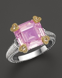 A bold cocktail ring makes a style statement in pink crystal and sterling silver with 18K yellow gold accents and white sapphires. A bold cocktail ring makes a style statement in pink crystal and sterling silver with 18K yellow gold accents and white sapphires.