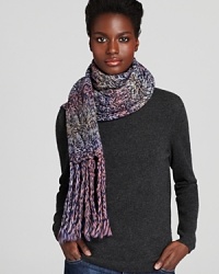 For supreme warmth and style, wrap up in UGG® Australia's chunky, space dyed scarf with long, twisted fringe edges. For supreme warmth and style, wrap up in UGG® Australia's chunky, space dyed scarf with long, twisted fringe edges.