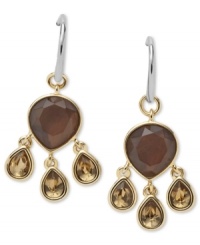 An alluring mix of drops create a lovely chandelier earring design from Fossil. Includes smoky quartz, tiger's eye, pyrite, glass and resin drops. Lobster claw closure. Crafted in gold tone mixed metal. Approximate drop: 1-1/2 inches. An alluring mix of drops create a lovely chandelier earring design from Fossil. Includes smoky quartz, tiger's eye, pyrite, glass and resin drops. Lobster claw closure. Crafted in gold tone mixed metal. Approximate drop: 1-1/2 inches.