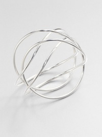From the Alliance Collection. A sleek tube of sterling silver crisscrosses the wrist in this alluringly simple design by Allan Scharff.Sterling silverDiameter, about 3Width, about 3Imported