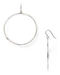Simplicity rules with this pair of sterling silver hoop earrings from Gorjana, flaunting a barely there design and delicate dangle. Simplicity rules with this pair of sterling silver hoop earrings from Gorjana, flaunting a barely there design and delicate dangle.