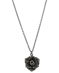 Petals to the metal. This necklace from GUESS is crafted from sprayed-jet mixed metal, with a flower pendant crafted from hematite-tone mixed metal and glass crystals adding luster. Item comes packaged in a signature GUESS Gift Box. Approximate length: 16 inches + 2-inch extender. Approximate drop: 1-1/2 inches. Petals to the metal. This necklace from GUESS is crafted from sprayed-jet mixed metal, with a flower pendant crafted from hematite-tone mixed metal and glass crystals adding luster. Item comes packaged in a signature GUESS Gift Box. Approximate length: 16 inches + 2-inch extender. Approximate drop: 1-1/2 inches.