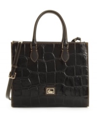 Embossed with a richly textured crocodile pattern, the leather Jenine purse by Dooney & Bourke achieves a bold beauty. Embossed with a richly textured crocodile pattern, the leather Jenine purse by Dooney & Bourke achieves a bold beauty.