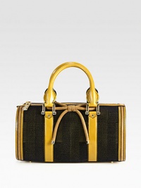 A luxurious blend of leather, velvet and nubuck leather in a well-crafted, petite design with a sweet bow.Double leather top handles, 5¼ dropTop zip closureProtective metal feetOne inside zip pocketTwo inside open pocketsCotton lining13½W X 7H X 6¼DMade in Italy A luxurious blend of leather, velvet and nubuck leather in a well-crafted, petite design with a sweet bow.Double leather top handles, 5¼ dropTop zip closureProtective metal feetOne inside zip pocketTwo inside open pocketsCotton lining13½W X 7H X 6¼DMade in Italy