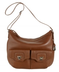 Vintage-inspired and oh-so desired. This lovely leather hobo from Cole Haan features beautifully polished hardware and conveniently placed exterior pockets. Vintage-inspired and oh-so desired. This lovely leather hobo from Cole Haan features beautifully polished hardware and conveniently placed exterior pockets.