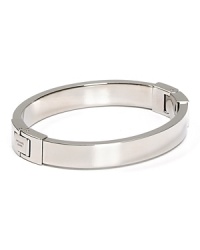 A subtle touch of shine, MICHAEL Michel Kors' sliver bangle defines versatile. Wear the shapely hinged style to add a silvery polish to any outfit. A subtle touch of shine, MICHAEL Michel Kors' sliver bangle defines versatile. Wear the shapely hinged style to add a silvery polish to any outfit.