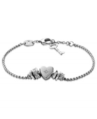 Fossil shows its heart is in the right place with this bracelet. Crafted from polished stainless steel, a clear glass crystal heart stands at the center, offset by beads for a nice touch. Approximate length: 6-3/4 inches + 3/4-inch extender. Fossil shows its heart is in the right place with this bracelet. Crafted from polished stainless steel, a clear glass crystal heart stands at the center, offset by beads for a nice touch. Approximate length: 6-3/4 inches + 3/4-inch extender.