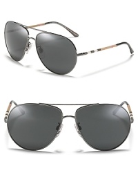 Burberry does the classic aviator in sleek metal with check wrapped sides. Burberry does the classic aviator in sleek metal with check wrapped sides.