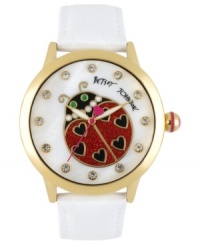 Total love bug. This Betsey Johnson watch features an adorable ladybug graphic on a white leather strap. Total love bug. This Betsey Johnson watch features an adorable ladybug graphic on a white leather strap.