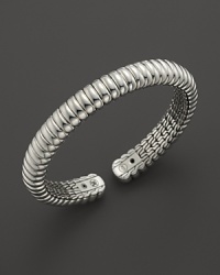 Slim, flexible sterling silver forms a stunning bracelet. From the John Hardy Bedeg Collection. Slim, flexible sterling silver forms a stunning bracelet. From the John Hardy Bedeg Collection.