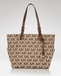 Vacation or day-about-town, this logo jacquard tote from MICHAEL ensures a stylish finish to your look. Vacation or day-about-town, this logo jacquard tote from MICHAEL ensures a stylish finish to your look.