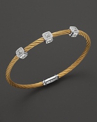From the Classique Collection, a stackable bangle in yellow gold and stainless steel with diamond stations. Designed by Charriol. From the Classique Collection, a stackable bangle in yellow gold and stainless steel with diamond stations. Designed by Charriol.