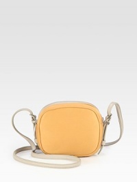A petite style in luxurious leather with a chic two-tone design.Adjustable shoulder strap, 25-27½ dropTwo zip compartmentsOne inside zip pocketSatin and leather lining6W X 5H X 2¾DMade in USA A petite style in luxurious leather with a chic two-tone design.Adjustable shoulder strap, 25-27½ dropTwo zip compartmentsOne inside zip pocketSatin and leather lining6W X 5H X 2¾DMade in USA