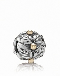 A festive holly-patterned charm in sterling silver and 14K gold complements your PANDORA bracelet during the holidays and all year-round. A festive holly-patterned charm in sterling silver and 14K gold complements your PANDORA bracelet during the holidays and all year-round.