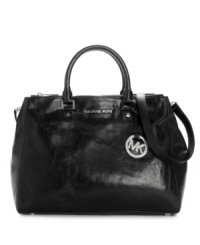 A versatile work-to-evening bag, the glossy Dressy tote features a polished exterior and protective feet that help it stay elegant and professional. A versatile work-to-evening bag, the glossy Dressy tote features a polished exterior and protective feet that help it stay elegant and professional.