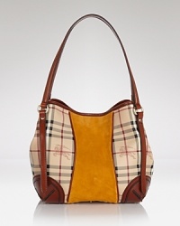 Burberry updates it's signature checked motif with bold color blocked detailing. In a shoulder-right size, this versatile accessory eases the transition from day to night. Burberry updates it's signature checked motif with bold color blocked detailing. In a shoulder-right size, this versatile accessory eases the transition from day to night.