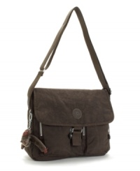 Kipling delivers on function and style with their versatile New Rita shoulder bag--it is finished in water resistant nylon and includes a signature monkey charm. Kipling delivers on function and style with their versatile New Rita shoulder bag--it is finished in water resistant nylon and includes a signature monkey charm.
