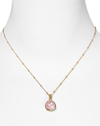 This haute bohemian pendant necklace from Coralia Leets charms with rich texture and hue. The gleaming gold setting sets off a rose quartz stone. This haute bohemian pendant necklace from Coralia Leets charms with rich texture and hue. The gleaming gold setting sets off a rose quartz stone.