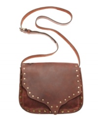 An ultra-cool burned edge finish adds an easy-going downtown vibe to this Patricia Nash bag. This crossbody design features goldtone stud embellishment and an embossed floret for a free-spirited feel. An ultra-cool burned edge finish adds an easy-going downtown vibe to this Patricia Nash bag. This crossbody design features goldtone stud embellishment and an embossed floret for a free-spirited feel.