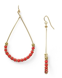 Give your look a hit of gypsy luxe with this pair of beaded teardrop hoop earrings from Vanessa Mooney. Crafted from gold plate with delicate beads, these earrings encapsulate breezy beauty. Give your look a hit of gypsy luxe with this pair of beaded teardrop hoop earrings from Vanessa Mooney. Crafted from gold plate with delicate beads, these earrings encapsulate breezy beauty.