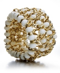 Bright pops of white lend a fresh, clean touch to any look. Style&co.'s stretch bracelet features white glass beads in an intricately-woven gold tone mixed metal setting. Approximate length: 7 inches. Bright pops of white lend a fresh, clean touch to any look. Style&co.'s stretch bracelet features white glass beads in an intricately-woven gold tone mixed metal setting. Approximate length: 7 inches.