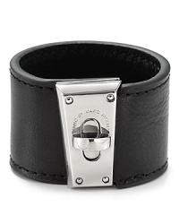 Pop and turnlock it with this tough-chic bracelet from MARC BY MARC JACOBS, which is crafted from leather. The bold brass hardware lends this chunky showpiece serious edge. Pop and turnlock it with this tough-chic bracelet from MARC BY MARC JACOBS, which is crafted from leather. The bold brass hardware lends this chunky showpiece serious edge.