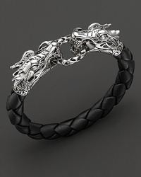From the Naga collection, a black woven leather bracelet with a double dragon detail, designed by John Hardy. From the Naga collection, a black woven leather bracelet with a double dragon detail, designed by John Hardy.