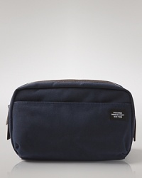 Rugged, stylish and roomy, the canvas toiletries bag is ready to see the world. Rugged, stylish and roomy, the canvas toiletries bag is ready to see the world.