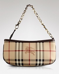 A bright tangerine trim lends of-the-moment appeal to this classic wristlet style from Burberry. Swing it to work a punchy London accent after dark. A bright tangerine trim lends of-the-moment appeal to this classic wristlet style from Burberry. Swing it to work a punchy London accent after dark.