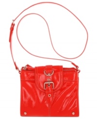 Get your shine on with this hipster-chic crossbody from Nine West that's offered in an array of bright, bold tones. Outfitted with buckle and stud detailing, the versatile hands-free design is ideal when you're on the move. Get your shine on with this hipster-chic crossbody from Nine West that's offered in an array of bright, bold tones. Outfitted with buckle and stud detailing, the versatile hands-free design is ideal when you're on the move.