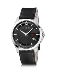 A diamante embossed face on a smooth leather strap lends Gucci's signature look to this versatile, timeless wristwatch. A diamante embossed face on a smooth leather strap lends Gucci's signature look to this versatile, timeless wristwatch.
