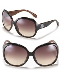 Oversized round sunglasses with an adorable Miss Marc graphic at temples. Oversized round sunglasses with an adorable Miss Marc graphic at temples.