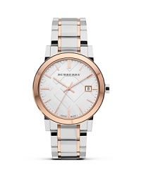 A two tone bracelet lends a hit of luxury to this richly styled Burberry watch, crafted of stainless steel with rose gold plated accents. A two tone bracelet lends a hit of luxury to this richly styled Burberry watch, crafted of stainless steel with rose gold plated accents.