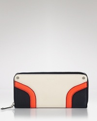 Styled in bold, color blocked leather, this Milly wallet has the style to match its substance. A well organized interior features one zip pocket, one slip pocket and 12 card slots. Styled in bold, color blocked leather, this Milly wallet has the style to match its substance. A well organized interior features one zip pocket, one slip pocket and 12 card slots.