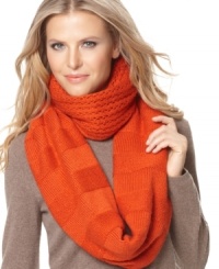 Keep things interesting this winter. Rich texture and saturated colors loop around and around on this knit infinity scarf by Nine West. Keep things interesting this winter. Rich texture and saturated colors loop around and around on this knit infinity scarf by Nine West.