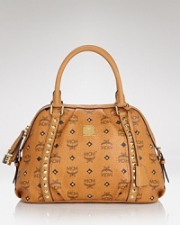 MCM is feeling classic - that's the approach behind the brand's update of it's ever-chic satchel. Crafted from durable logo-stamped canvas and accented with studs, it scores points for statement-making ease. MCM is feeling classic - that's the approach behind the brand's update of it's ever-chic satchel. Crafted from durable logo-stamped canvas and accented with studs, it scores points for statement-making ease.