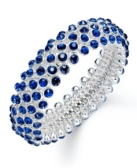 Slip on some soothing tones that add allure to any look. Charter Club's chic bubble beaded style features blue glass accents in silver tone mixed metal. Bracelet stretches to fit wrist. Approximate diameter: 2-1/4 inches. Slip on some soothing tones that add allure to any look. Charter Club's chic bubble beaded style features blue glass accents in silver tone mixed metal. Bracelet stretches to fit wrist. Approximate diameter: 2-1/4 inches.