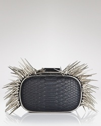 At night, we're trading tame accessories for bold styles, like this spiked clutch from BCBGMAXAZRIA. It's a perfect punk-chic punctuation mark. At night, we're trading tame accessories for bold styles, like this spiked clutch from BCBGMAXAZRIA. It's a perfect punk-chic punctuation mark.