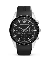This Emporio Armani piece works hard with a versatile style that goes on-and-off the clock, crafted of a stainless steel case with a rubber strap as a sporty counterpart. This Emporio Armani piece works hard with a versatile style that goes on-and-off the clock, crafted of a stainless steel case with a rubber strap as a sporty counterpart.