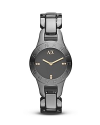 This Armani Exchange timepiece is sleekly polish in darkened stainless steel embellished with Swarovski crystals. This Armani Exchange timepiece is sleekly polish in darkened stainless steel embellished with Swarovski crystals.