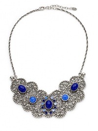 THE LOOKGypsy CollectionBib silhouetteLapis cabochon, blue opal and Swarovski crystal accentsAntique silverplated settingLobster claspTHE MEASUREMENTBib drop, about 2½Length, about 24ORIGINMade in USA THE LOOKGypsy CollectionBib silhouetteLapis cabochon, blue opal and Swarovski crystal accentsAntique silverplated settingLobster claspTHE MEASUREMENTBib drop, about 2½Length, about 24ORIGINMade in USA