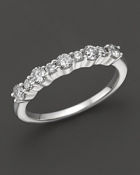 Diamond band in 14K white gold. Diamond band in 14K white gold.