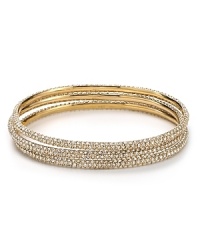 Stack the sparkles with this plated gold ABS by Allen Schwartz bangle set, styled to trace the wrist in delicate crystals. Stack the sparkles with this plated gold ABS by Allen Schwartz bangle set, styled to trace the wrist in delicate crystals.