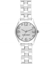 A clean and classic design with a charming twist, by Nine West. Watch crafted of silver tone mixed metal bracelet and round case. Silver tone dial features applied numerals, hour and minute hands, sweeping second hand and logo at six o'clock. Quartz movement. Limited lifetime warranty. A clean and classic design with a charming twist, by Nine West. Watch crafted of silver tone mixed metal bracelet and round case. Silver tone dial features applied numerals, hour and minute hands, sweeping second hand and logo at six o'clock. Quartz movement. Limited lifetime warranty.