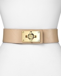 A bold turnlock asserts tough-girl glamour on this Tory Burch belt, composed of smooth leather and elastic. It's an edgy must-have over a body-con mini dress with towering stiletto booties. A bold turnlock asserts tough-girl glamour on this Tory Burch belt, composed of smooth leather and elastic. It's an edgy must-have over a body-con mini dress with towering stiletto booties.